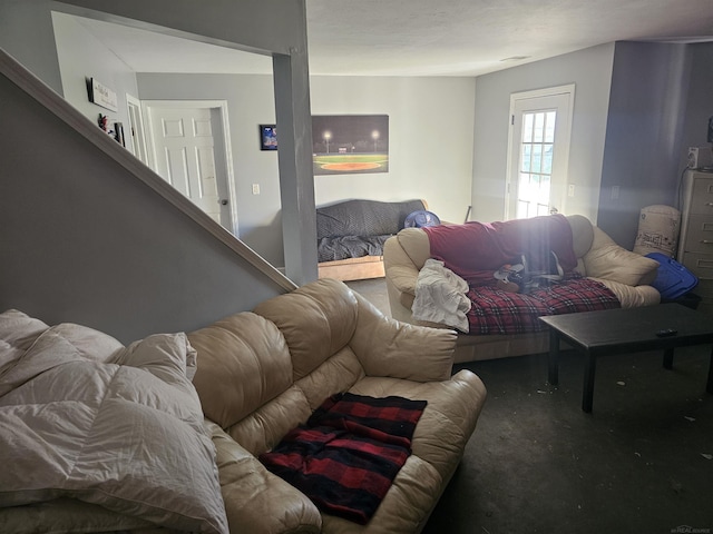 11639 State Rd, Nunica, MI 49448 - living room featuring stairway