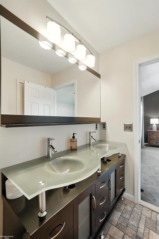 31222 Settlers Way Dr, Flat Rock, MI 48134 - bathroom with double vanity and baseboards