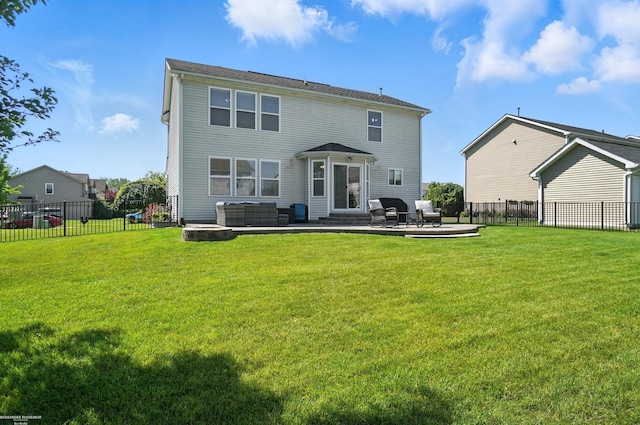 31222 Settlers Way Dr, Flat Rock, MI 48134 - back of house with entry steps, a patio, a fire pit, and a fenced backyard