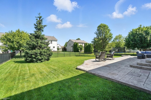 31222 Settlers Way Dr, Flat Rock, MI 48134 - fenced backyard with a patio and a trampoline