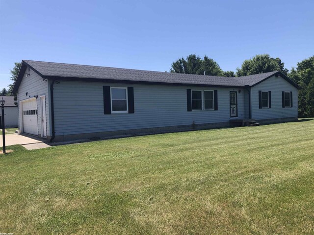 17250 Armada Center Rd, Armada, MI 48005 - ranch-style home featuring a front lawn, a garage, and a shingled roof