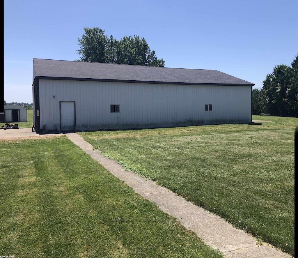 17250 Armada Center Rd, Armada, MI 48005 - view of pole building with a yard