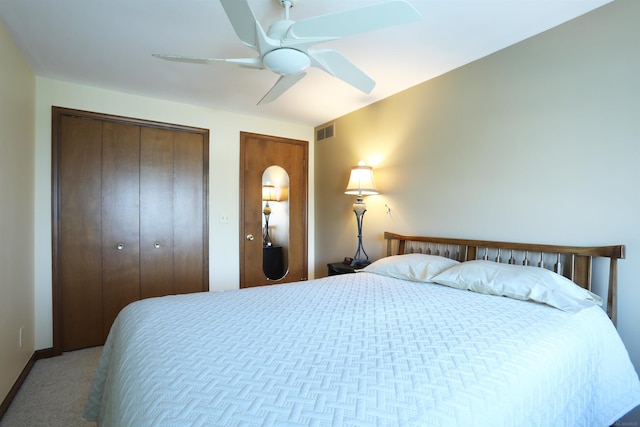 129 Cherryl Ln, Algonac, MI 48001 - carpeted bedroom featuring multiple closets and ceiling fan