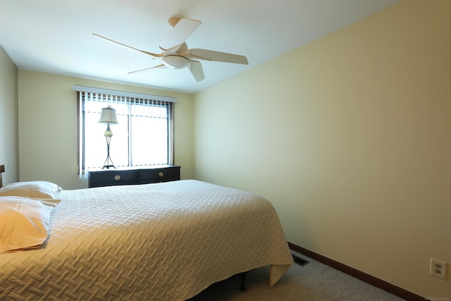 129 Cherryl Ln, Algonac, MI 48001 - carpeted bedroom with a ceiling fan and baseboards