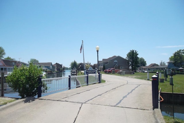 129 Cherryl Ln, Algonac, MI 48001 - view of concrete road with a residential view and street lights