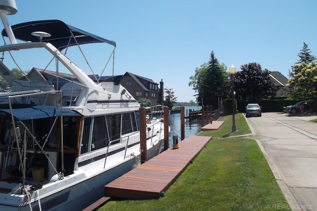129 Cherryl Ln, Algonac, MI 48001 - dock with a water view and a yard