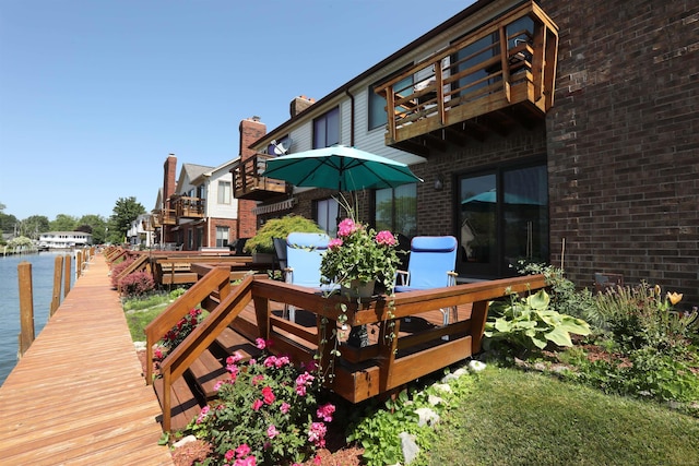 129 Cherryl Ln, Algonac, MI 48001 - wooden deck with a water view and a dock