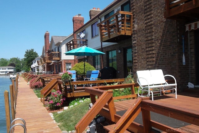 129 Cherryl Ln, Algonac, MI 48001 - wooden deck featuring a water view and a grill