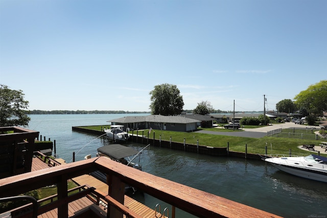 129 Cherryl Ln, Algonac, MI 48001 - dock area with a water view and a lawn