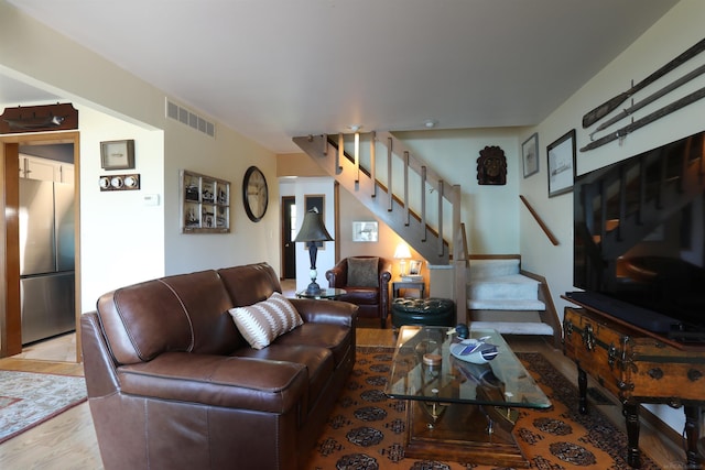 129 Cherryl Ln, Algonac, MI 48001 - living room with stairway and wood finished floors