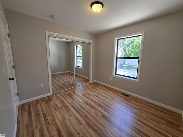 1329 Vermont Rd, Marysville, MI 48040 - unfurnished bedroom with wood finished floors and a closet