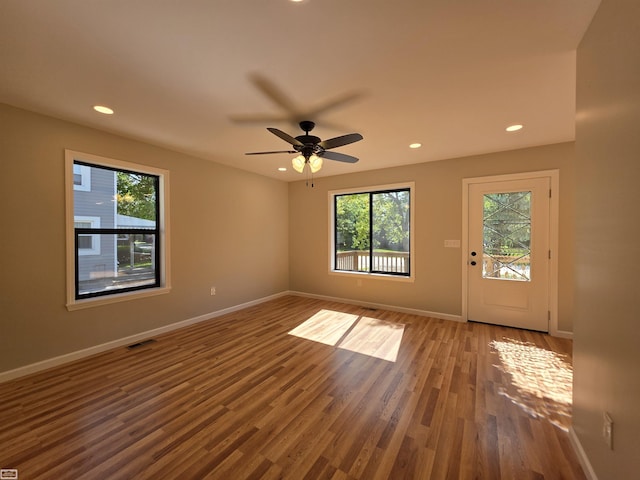 1329 Vermont Rd, Marysville, MI 48040 - unfurnished room with plenty of natural light, wood finished floors, recessed lighting, and ceiling fan