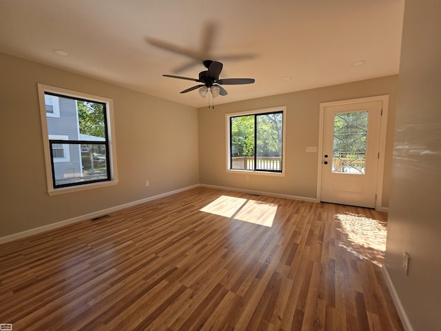 1329 Vermont Rd, Marysville, MI 48040 - empty room featuring plenty of natural light, wood finished floors, and ceiling fan