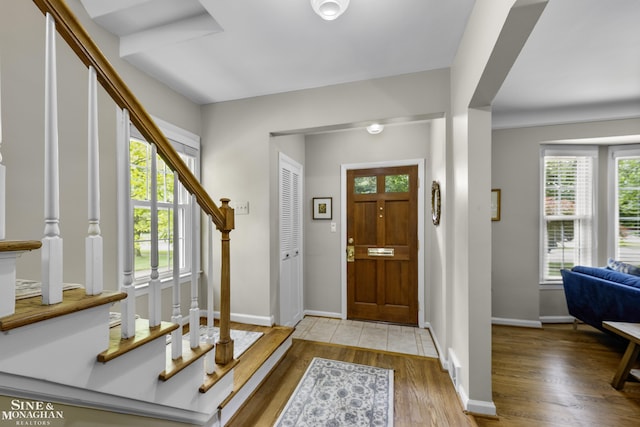 1344 Torrey Rd, Grosse Pointe Woods, MI 48236 - foyer with stairway and light wood-style flooring