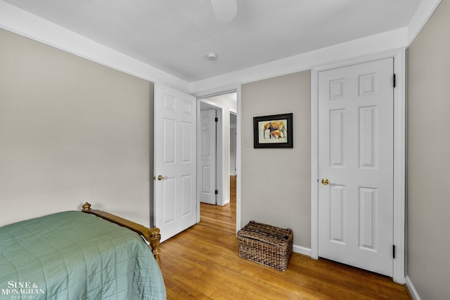 1344 Torrey Rd, Grosse Pointe Woods, MI 48236 - bedroom featuring wood finished floors and baseboards