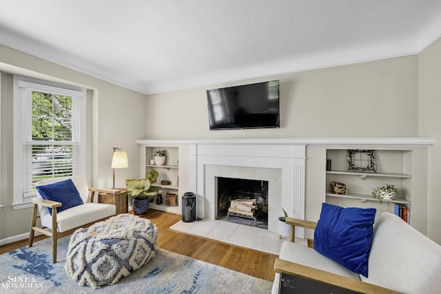 1344 Torrey Rd, Grosse Pointe Woods, MI 48236 - living area featuring wood finished floors and a fireplace
