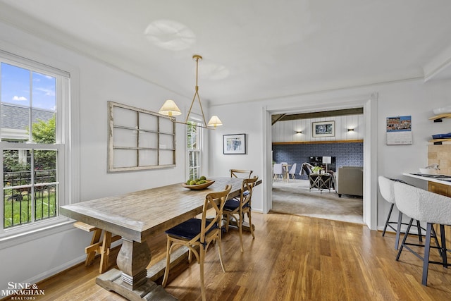 1344 Torrey Rd, Grosse Pointe Woods, MI 48236 - dining space featuring baseboards and wood finished floors