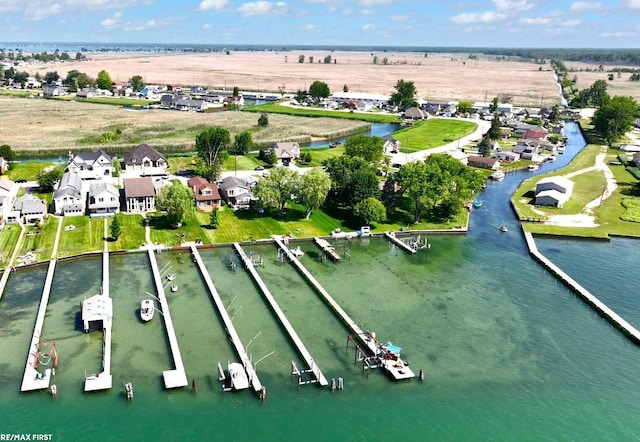 10125 Saint John Dr, Algonac, MI 48001 - aerial view of property and surrounding area featuring a large body of water and nearby suburban area