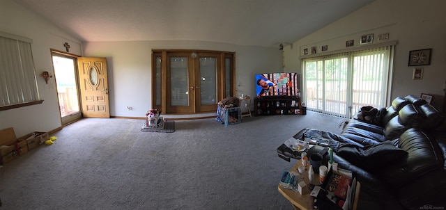 55305 Fairchild Rd, Macomb, MI 48042 - carpeted living area featuring vaulted ceiling, healthy amount of natural light, and french doors