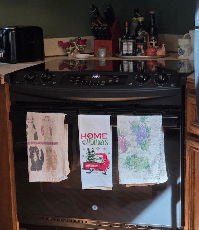55305 Fairchild Rd, Macomb, MI 48042 - kitchen view of black range with electric stovetop