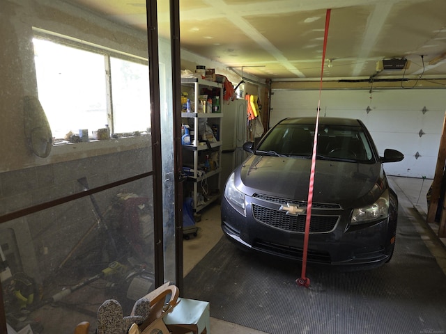 55305 Fairchild Rd, Macomb, MI 48042 - garage featuring a garage door opener