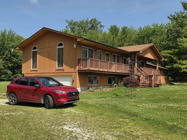 55305 Fairchild Rd, Macomb, MI 48042 - rear view of house featuring a yard and an attached garage
