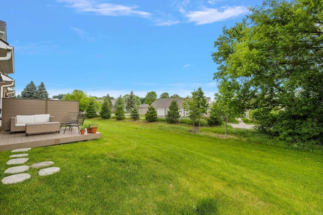 8599 Grove St, Washington Twp, MI 48094 - view of green lawn with outdoor lounge area and a deck