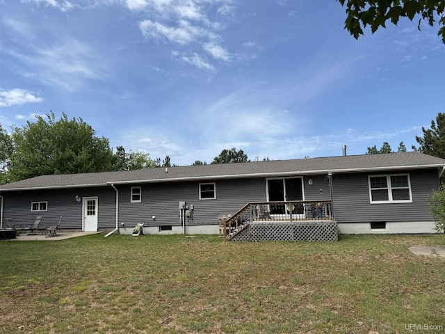 N7722 Candy Cane Rd, Munising, MI 49862 - back of house with a yard, a wooden deck, and a patio