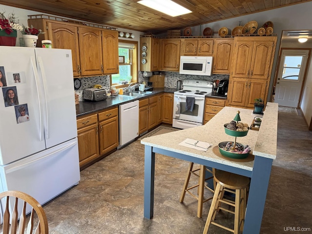 N7722 Candy Cane Rd, Munising, MI 49862 - kitchen with white appliances, wooden ceiling, decorative backsplash, brown cabinets, and a breakfast bar