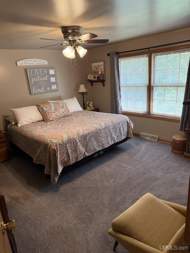 N7722 Candy Cane Rd, Munising, MI 49862 - carpeted bedroom featuring a ceiling fan and baseboards