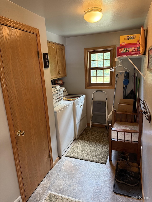 N7722 Candy Cane Rd, Munising, MI 49862 - washroom featuring washer and dryer and cabinet space
