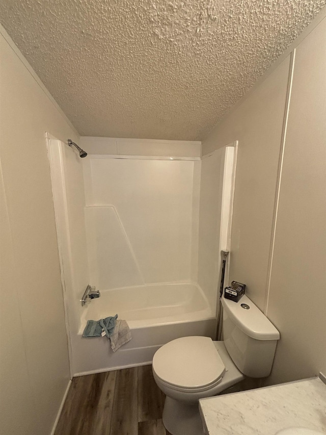 2299 Bart St, Croswell, MI 48422 - bathroom with a textured ceiling, wood finished floors, vanity, and shower / bath combination