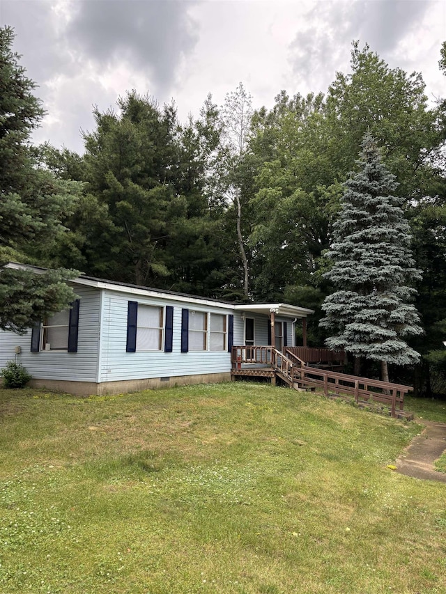 2299 Bart St, Croswell, MI 48422 - manufactured / mobile home featuring a front yard and a porch