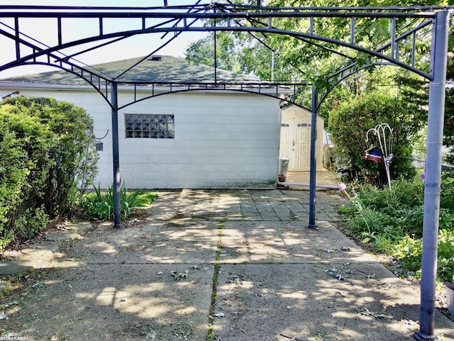 23311 Courtland Ave, Eastpointe, MI 48021 - view of patio / terrace featuring a storage shed