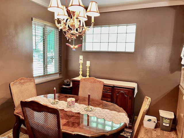 23311 Courtland Ave, Eastpointe, MI 48021 - dining room featuring a chandelier and wood finished floors