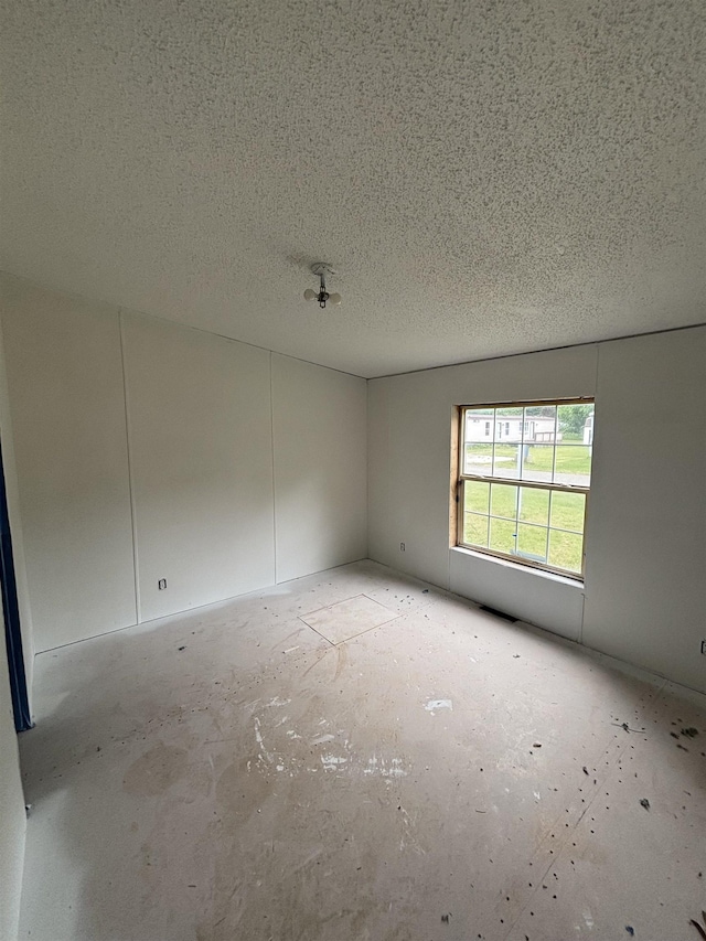 2266 Bart St, Croswell, MI 48422 - empty room featuring a textured ceiling