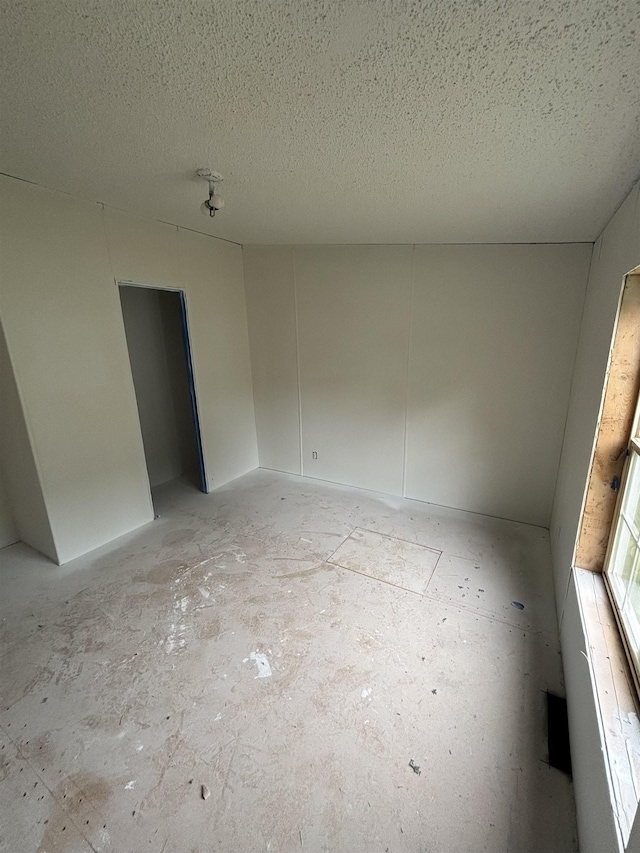 2266 Bart St, Croswell, MI 48422 - empty room with a textured ceiling