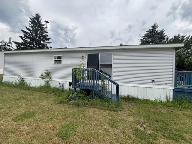 2266 Bart St, Croswell, MI 48422 - rear view of house featuring a lawn