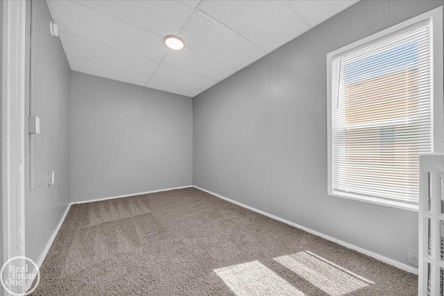 1118 Bancroft St, Port Huron, MI 48060 - carpeted spare room featuring a paneled ceiling and a smoke detector
