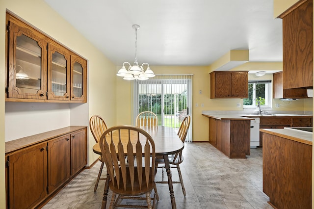50705 Linda Ln, Shelby, MI 48317 - dining space with a chandelier and baseboards