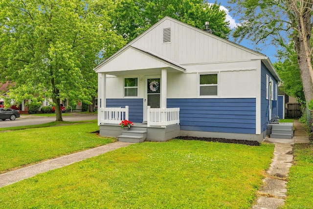 1404 Pine St, Port Huron, MI 48060 - bungalow featuring a porch