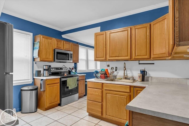 2019 Griswold St, Port Huron, MI 48060 - kitchen featuring appliances with stainless steel finishes, light tile patterned floors, light countertops, and ornamental molding