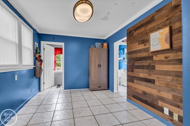 2019 Griswold St, Port Huron, MI 48060 - unfurnished bedroom featuring crown molding and light tile patterned floors