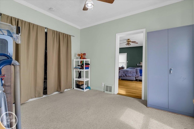 2019 Griswold St, Port Huron, MI 48060 - carpeted bedroom featuring ornamental molding and ceiling fan