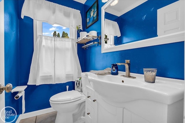 2019 Griswold St, Port Huron, MI 48060 - half bath with vanity, ornamental molding, and tile patterned floors