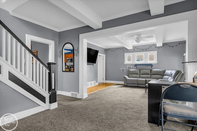 2019 Griswold St, Port Huron, MI 48060 - living area featuring carpet flooring, beam ceiling, ceiling fan, crown molding, and stairway