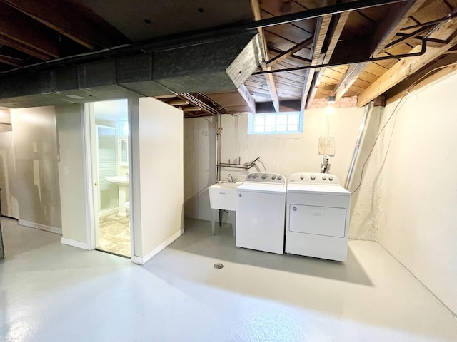 26315 Ursuline St, Saint Clair Shores, MI 48081 - below grade area featuring washing machine and clothes dryer and a sink