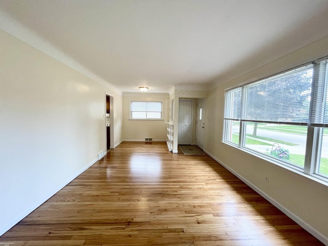 26315 Ursuline St, Saint Clair Shores, MI 48081 - unfurnished living room featuring light wood finished floors