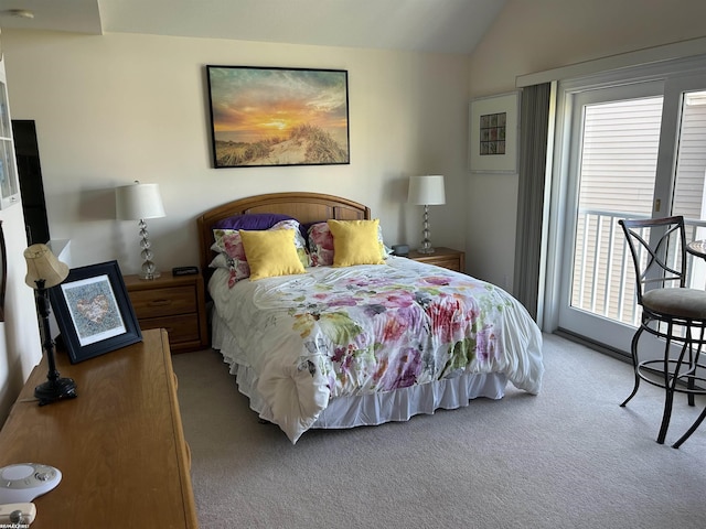 15 E Spring Ct Unit 12, Port Austin, MI 48467 - carpeted bedroom featuring lofted ceiling and access to exterior