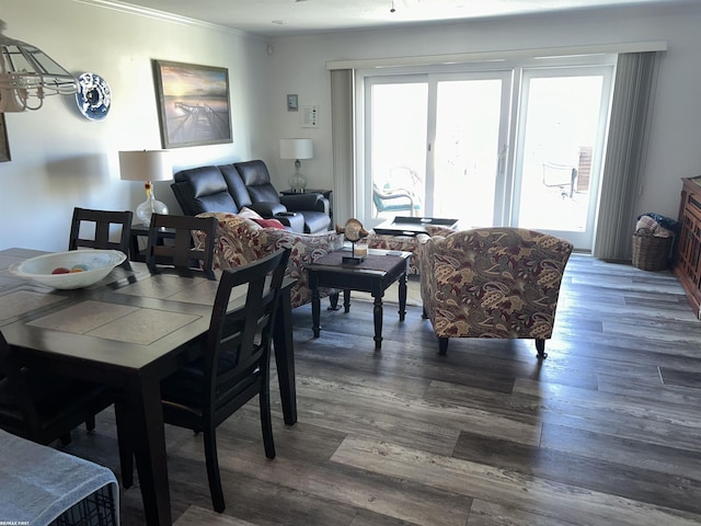 15 E Spring Ct Unit 12, Port Austin, MI 48467 - dining area featuring wood finished floors and crown molding